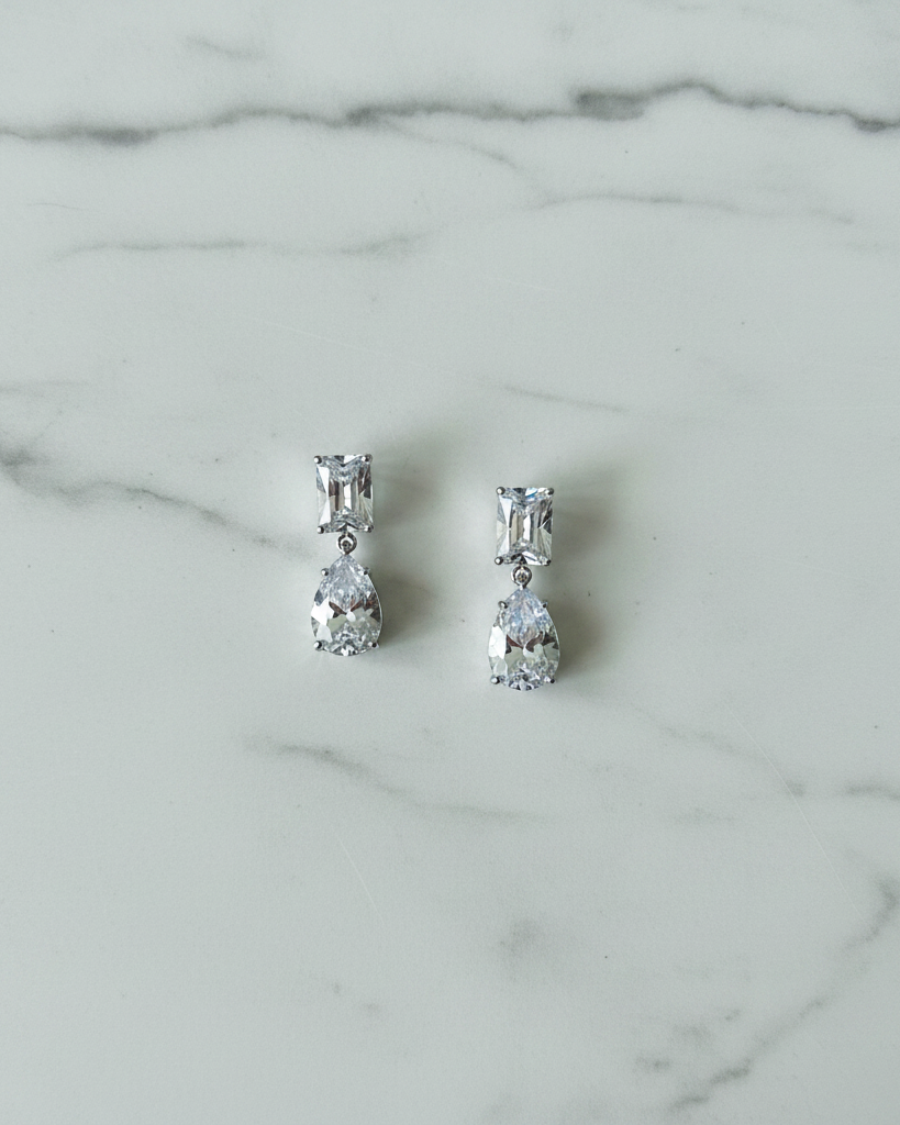 Ada White Gold Bridal Earring - white marble flat lay