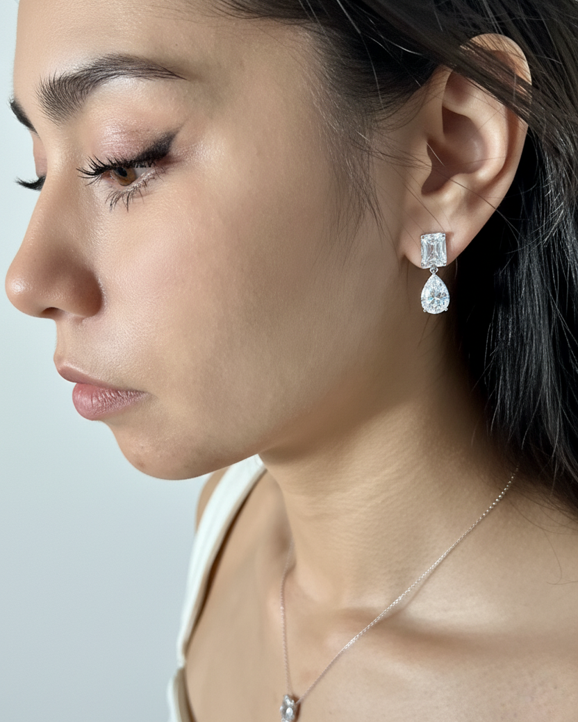Ada White Gold Bridal Earring - rear three-quarter view on model