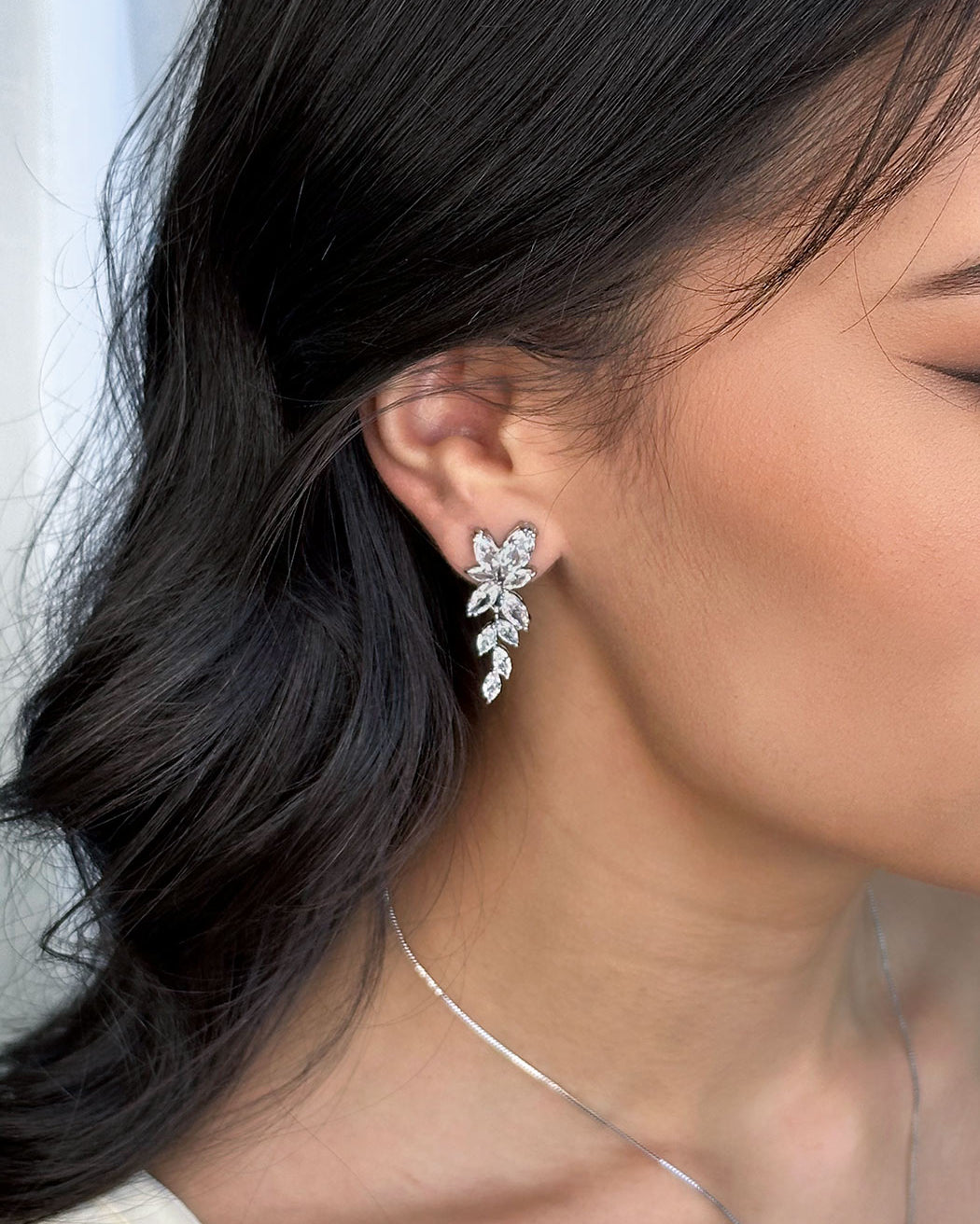 Celia Bridal Earring worn by a dark haired model