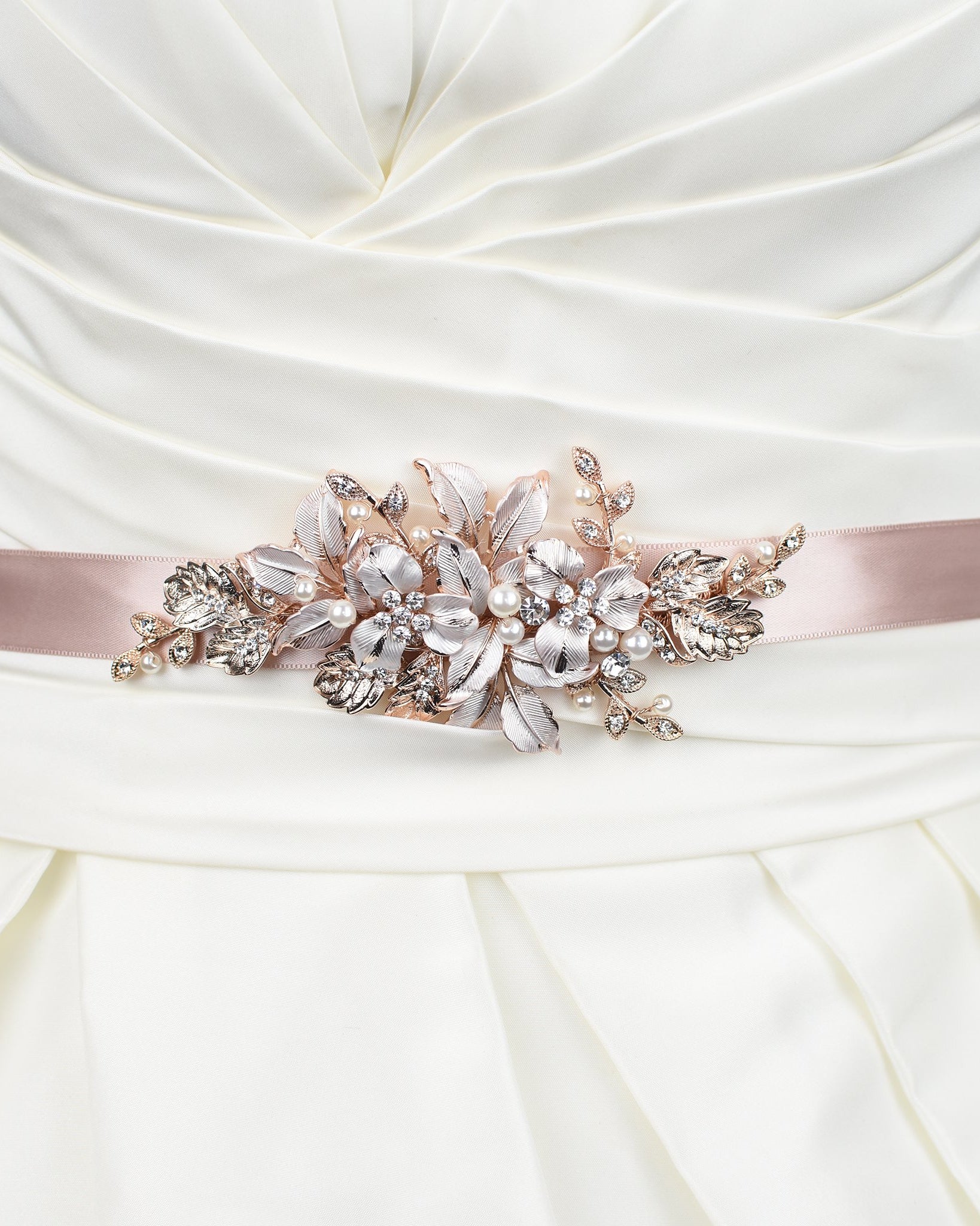Pale Rose Gold Bridal Belt with leaves and flowers on matching dusty pink ribbon worn on an ivory bridal gown