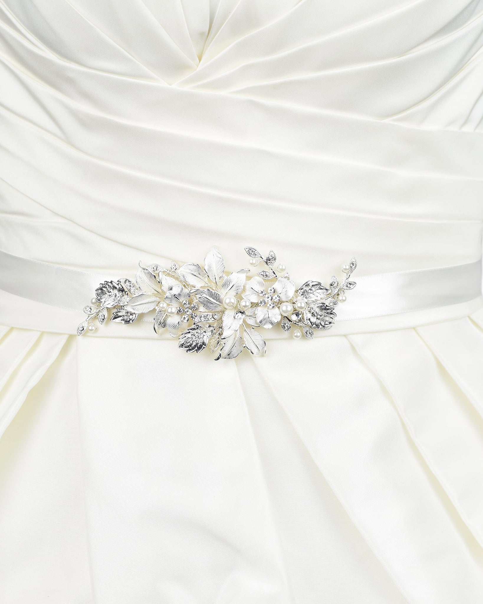 Soft Silver Bridal Sash with leaves and flowers on an ivory ribbon worn on an ivory bridal gown