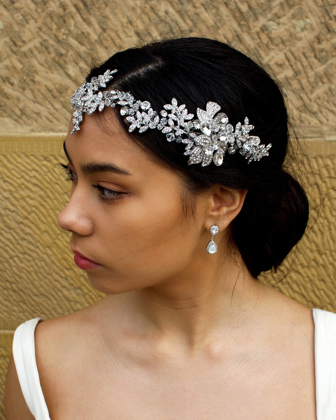 Long Bridal Vine covered in tiny crystals worn by a dark hair model