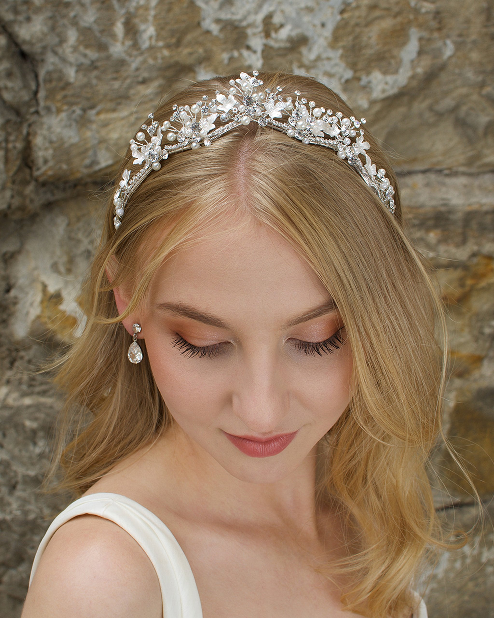 Low Bridal Headband in silver with pearls worn by blonde bride