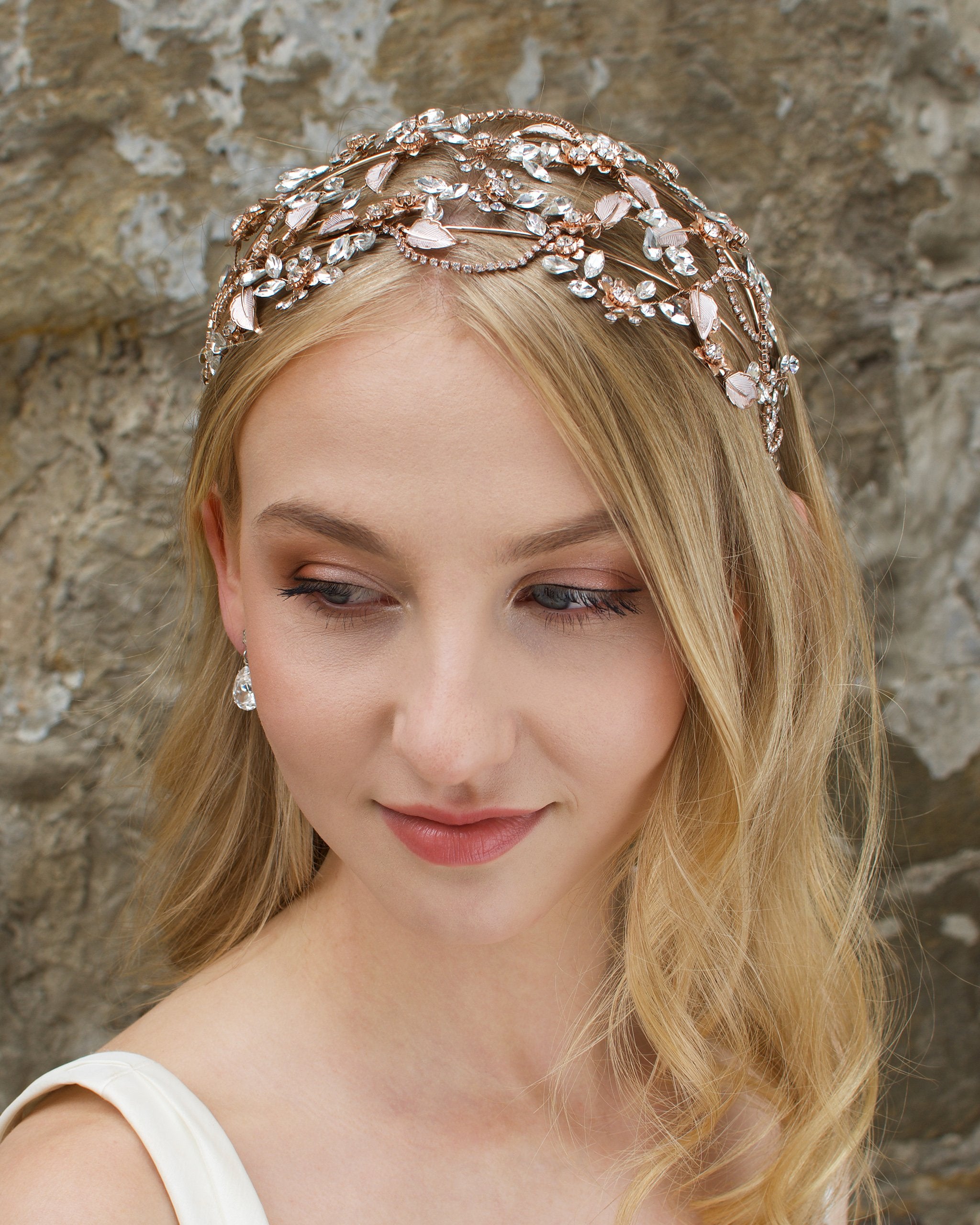 Wide Bridal Headband in Rose Gold worn by a bridal model
