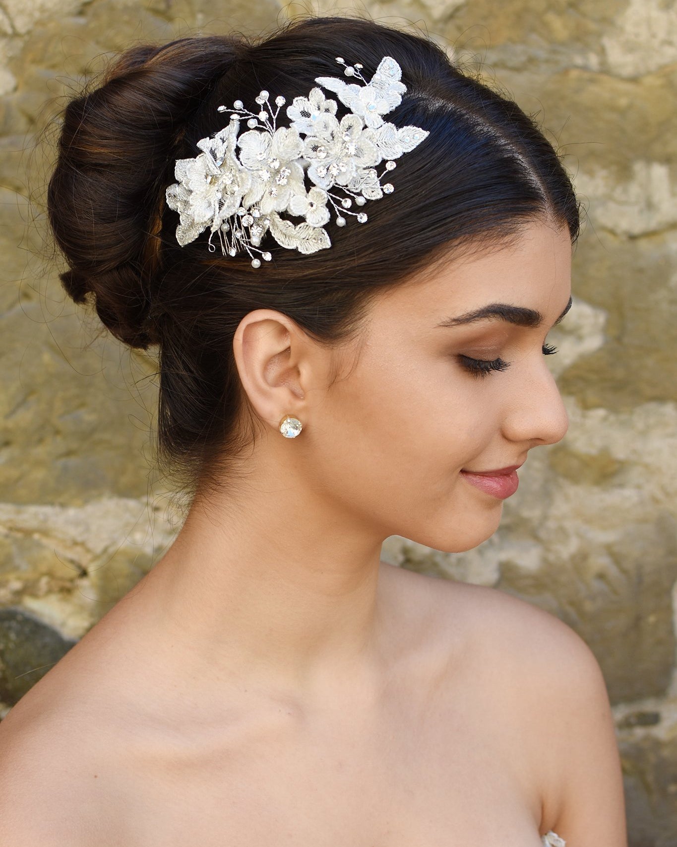 Ivory lace bridal side comb with few crystals shown with Bridal hair style
