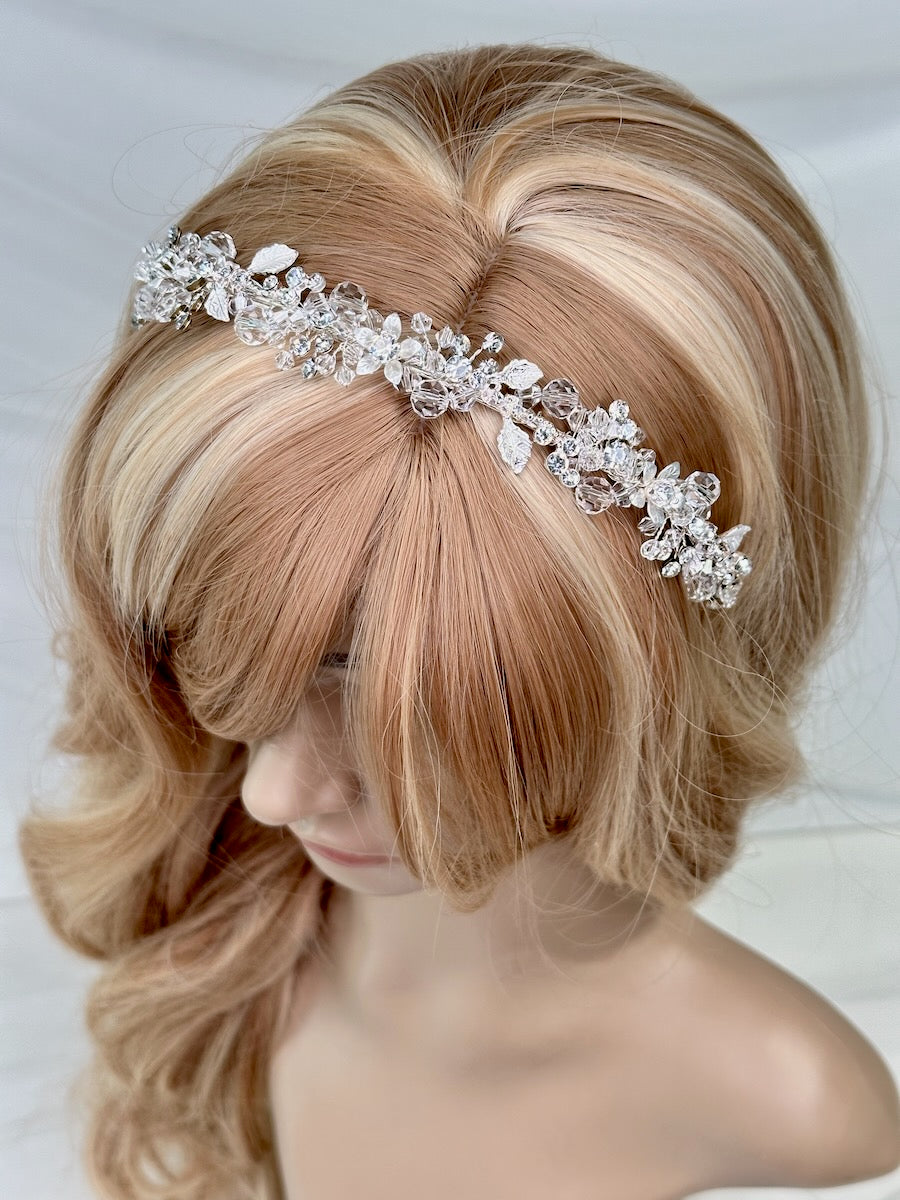 Faith Silver Crystal headband a modern bridal headpiece worn by a model head