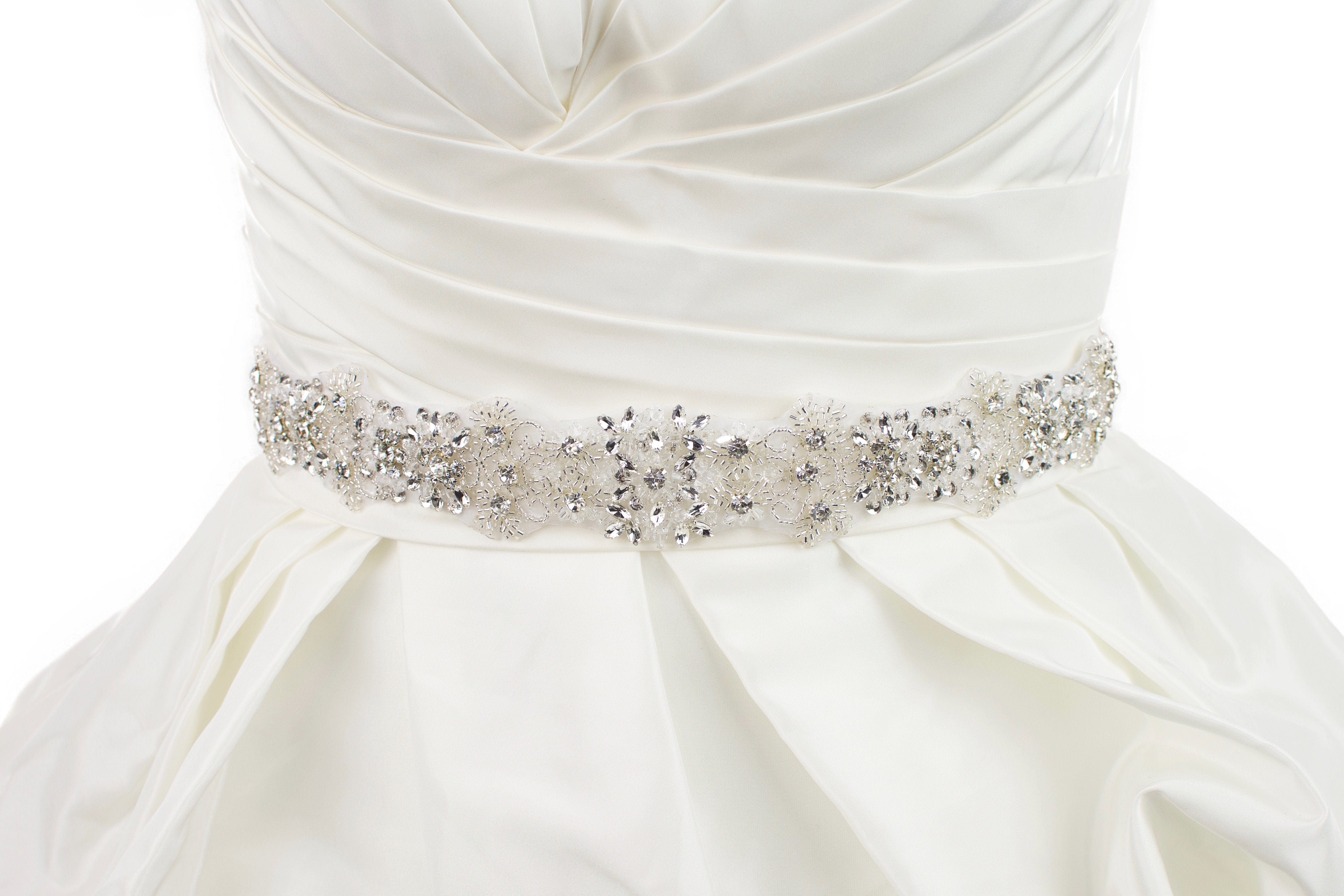 Crystals and beads Bridal Sash worn on organza ribbon on an ivory bridal gown with white background