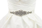 A short wide bridal belt worn on a bridal dress