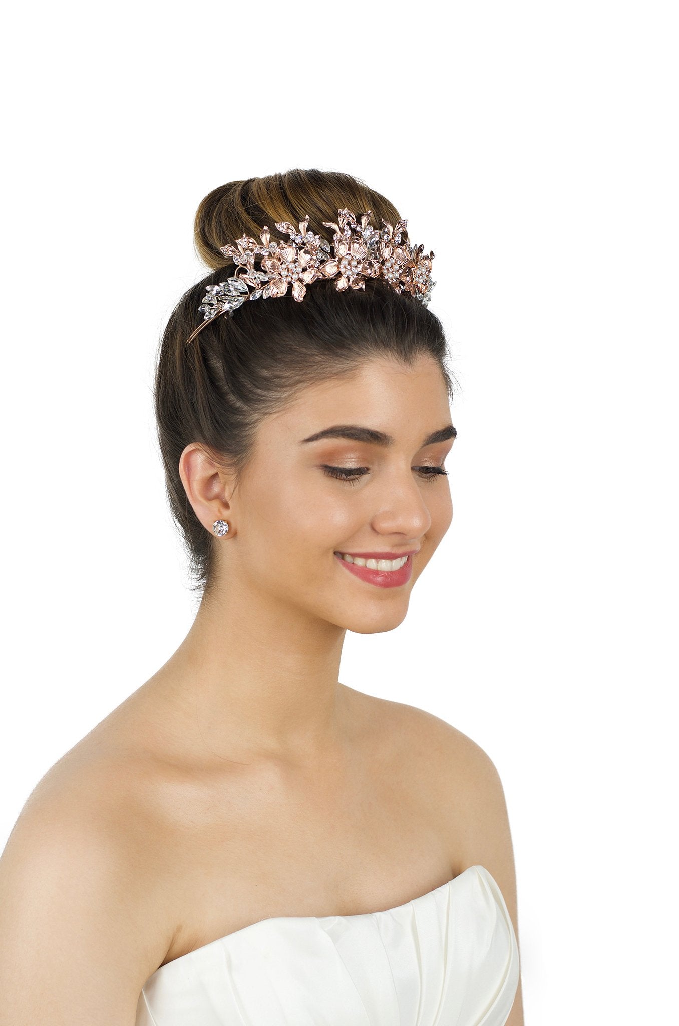 Rose Gold Flowers headpiece worn by a dark hair Bride with a white background