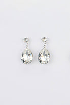 Bright Silver earring in a pear shape with clear swarovski stones