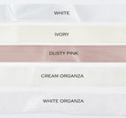 five different colours of satin ribbon on a white background